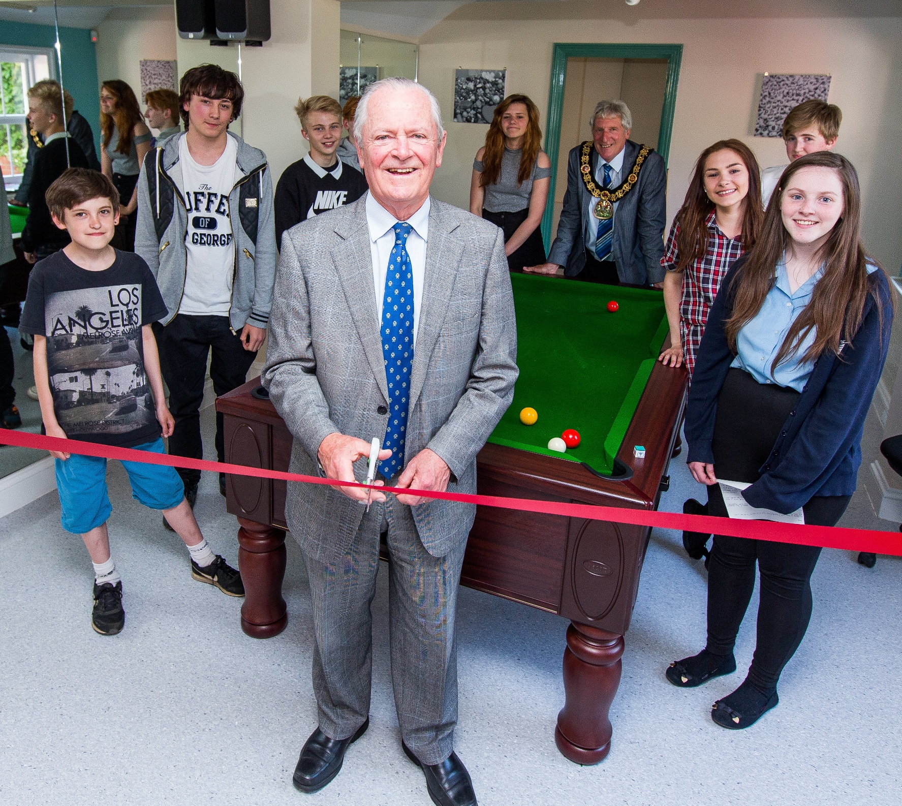 Mike Hill cuts to the ribbon to launch the new Youth Hub in Tunbridge Wells.